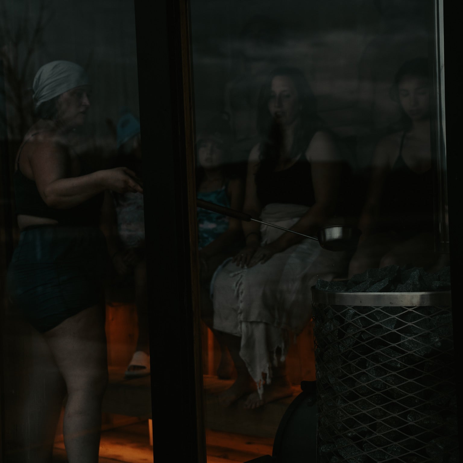 Friends gathered at a Nightjar outdoor sauna